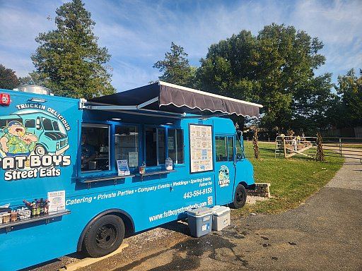 Fat Boys Street Eats truck at a morning community event